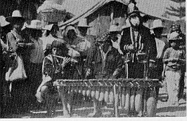image: marimba sounds the Hunahpú-coy song